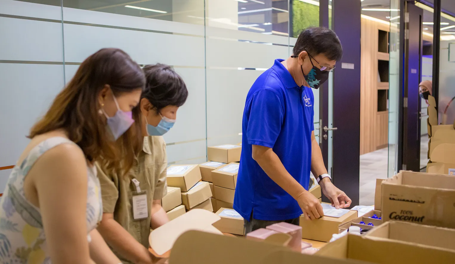 NTUC Club Quadrennial Report - Our management curated special wellness goodies and personally packed them for distribution to all Club staff