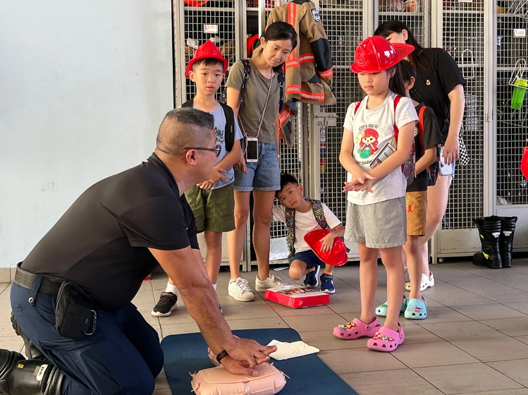 NTUC Club Quadrennial Report - Visit to Tampines Fire station