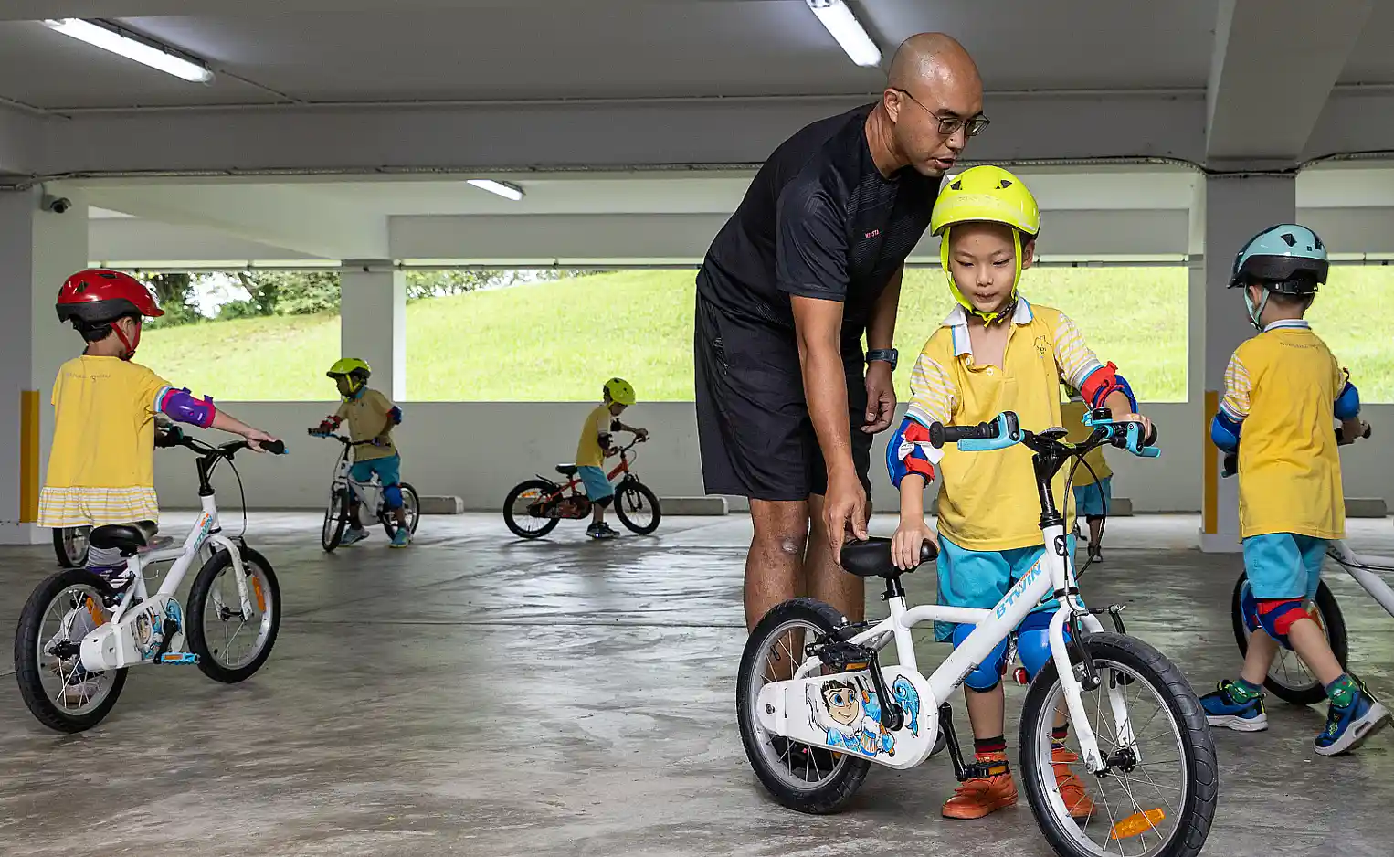 NTUC Club Quadrennial Report - Learn to Cycle programme with Little Skool House