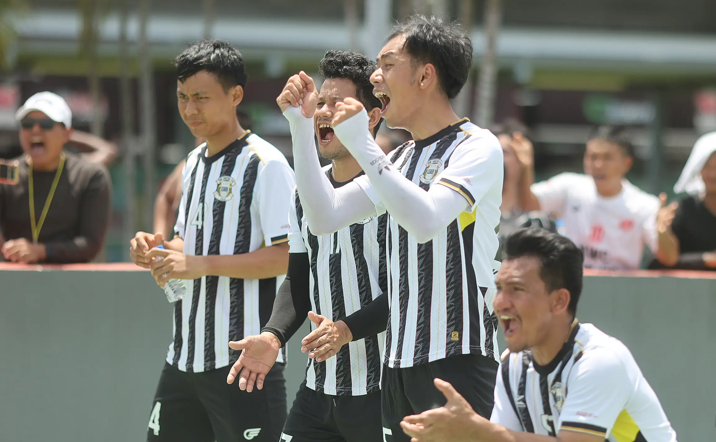 NTUC Club Quadrennial Report - Futsal Tournament for Migrant Workers