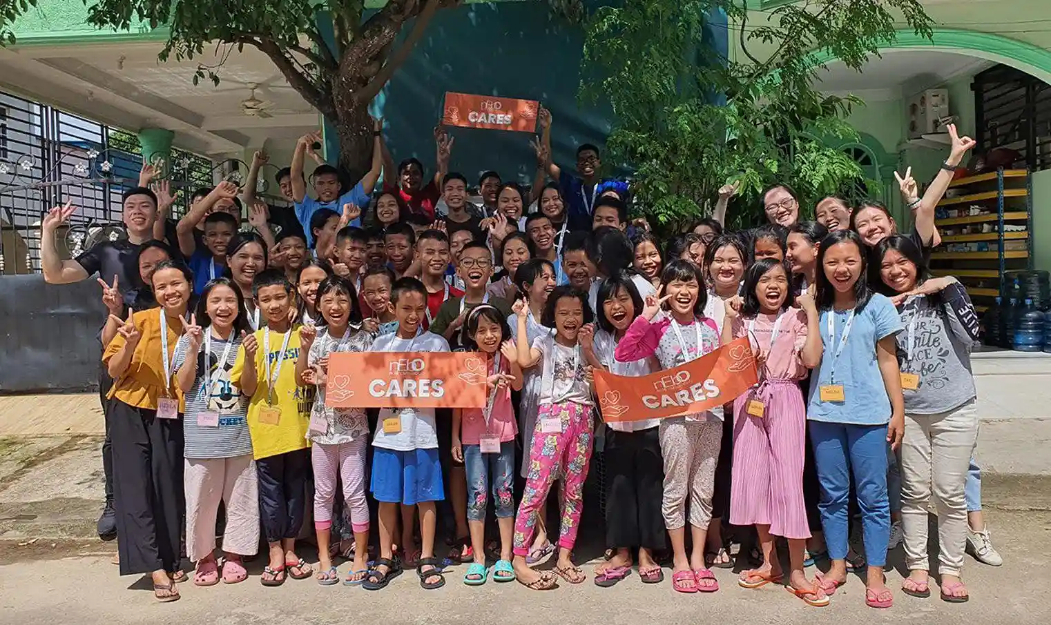 NTUC Club Quadrennial Report - nEbO spreading love to the orphans in Batam