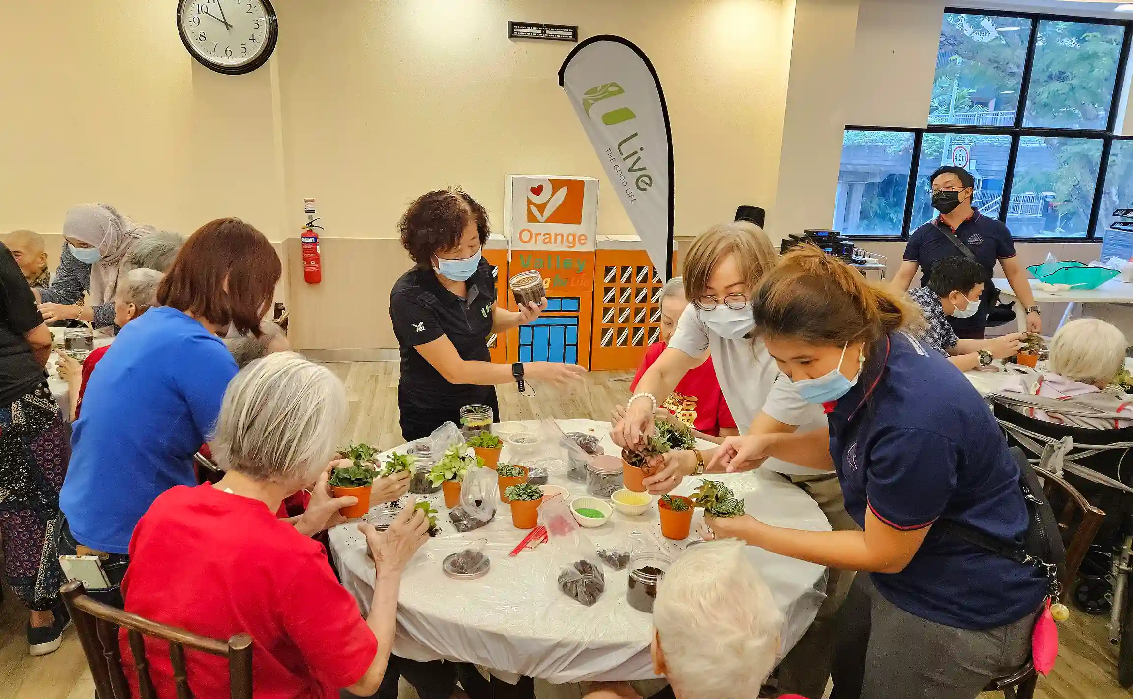 NTUC Club Quadrennial Report - U Live (IRASSU terrarium-making session)